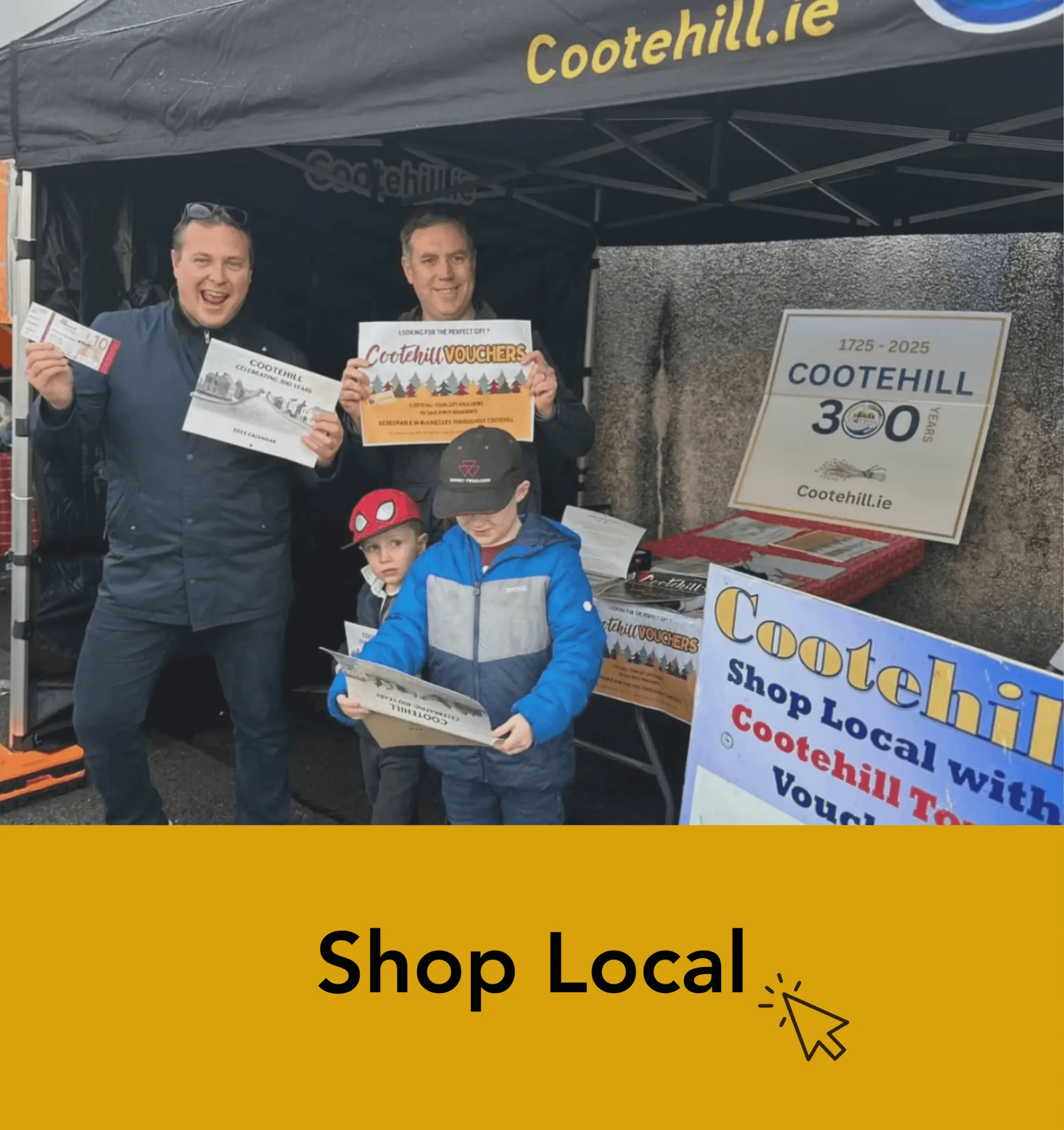 Shop Local tent at the 2024 Christmas Market, helmed by volunteers, with a 'Shop Local' line, encouraging visitors to click.